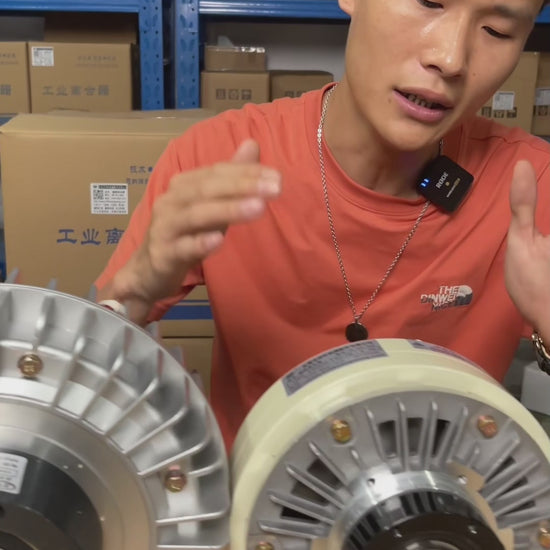 Through bore magnetic particle clutch used in slitting and rewinding machines