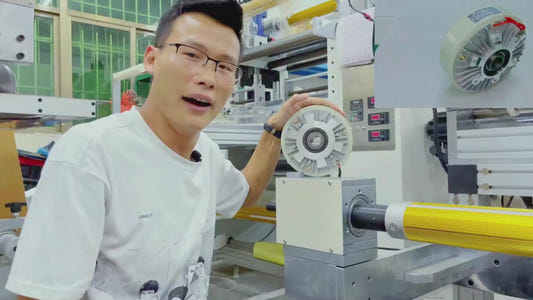 Compact ultra thin magnetic particle clutch used in slitting and rewinding machines for precise tension control